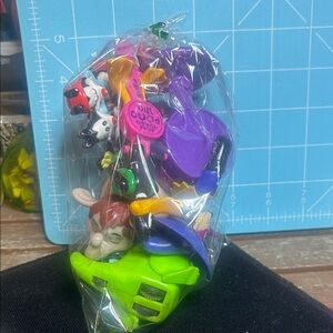 MYSTERY BAG Colorful Kids Toy Figure Pack - Purple, Green, Yellow, Black